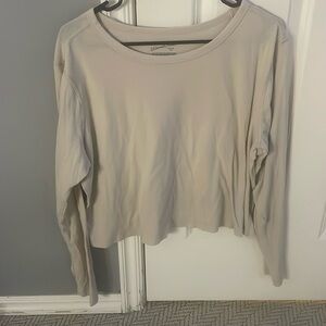 tan colored long sleeve. great quality. super thin. breathes easily.